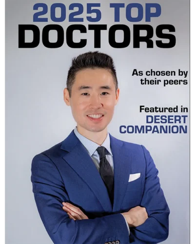 Professional doctor Harry Ching MD in blue suit named 2025 Top Doctor by peers, featured in Desert Companion magazine